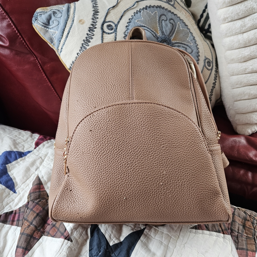 Kuan Kuan Xiu leather backpack